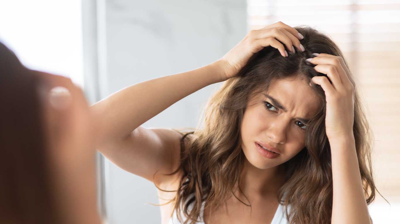 What causes a dry scalp?